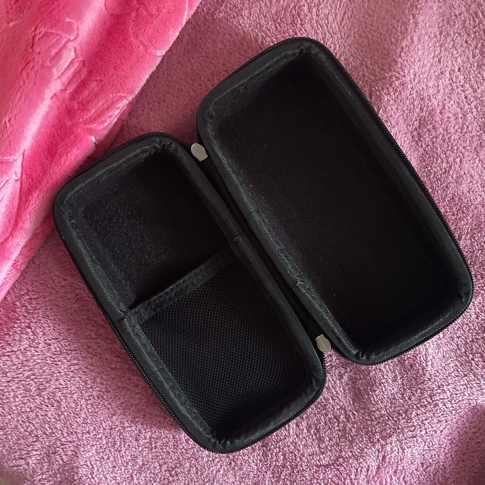 Hermit shell speaker with case and charger .